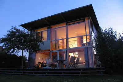 Image de Maison en verre sur les rives du Müritz, plage privée, vue panoramique, sauna, équitation