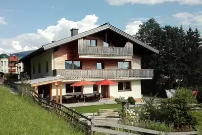Image de Maison Sonnhof Ă Walchsee, dans le Tyrol, le lac, vue sur le lac, jardin, jeu