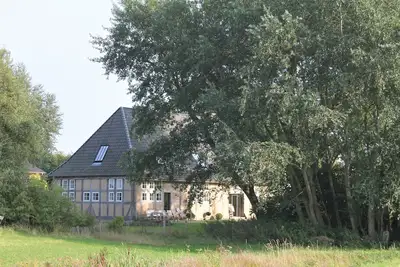 Image de Ancienne grange près de la plage avec cheminée, sauna et beaucoup d'espace pour les familles