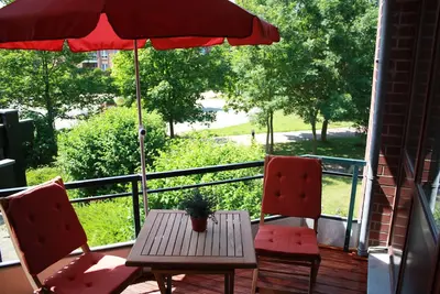 Image de 3 * appartement dans un quartier calme de TravemĂĽnde, piscine et sauna dans la maison, WiFi, Balcon
