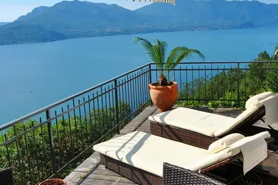 Maison de vacances de style boutique de très bon goût avec une vue fantastique sur le lac