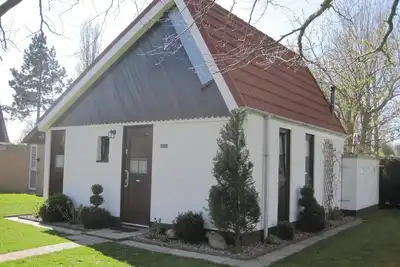 Image de maison de vacances confortable dans un parc adapté aux enfants