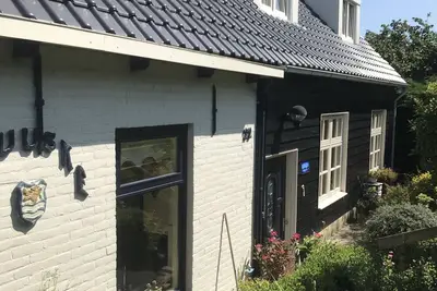 Image de Appartement ensoleillé confortable, 2 pax avec grand jardin, près de la mer de Grevelingen, WiFi