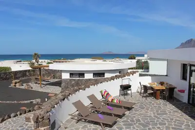 Image de Daida Beach home de luxe sur la plage avec bain à remous emplacement fantastique
