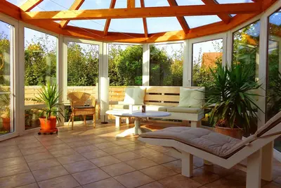 Image de Appartement confortable avec jardin d'hiver, cheminée et terrasse grill. . .