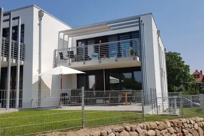 Top appartement sur Rügen avec vue sur l'eau et de superbes vues sur Stralsund.