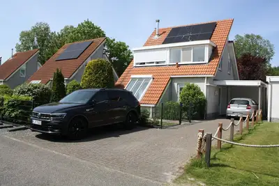 Image de de Luxe Maison de vacances dans parc 5 * 700m² jardin Scharendijke Zélande mer, chien, WiFi