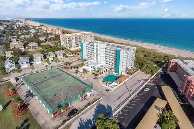 Image de Excellent emplacement! Condo 2 chambres face Ă la mer sur la plage de cacao