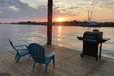 Image de Jazz Fest puis détendez-vous sur les magnifiques Bayous de la Louisiane. Le meilleur des deux mondes
