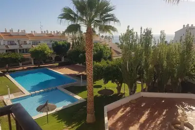 Image de Apt dans les jardins, grande piscine, à quelques pas de la mer, près de la plage principale et de la promenade