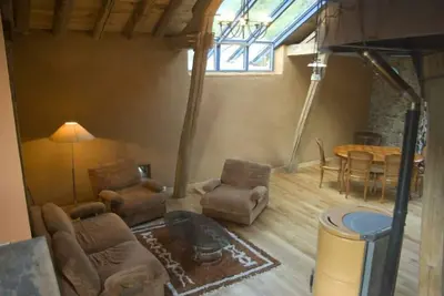 Image de loft aménagé dans d'anciennes écuries