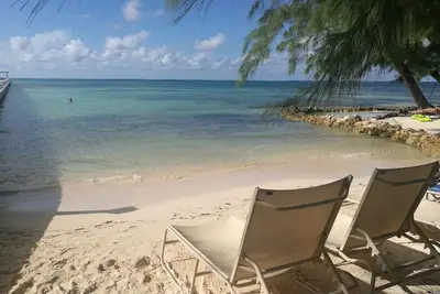 Image de Grand condo de 2 chambres et 2 salles de bain avec terrasse vue mer, à 1 min à pied de la plage