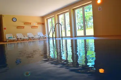 Image de Appartement confortable et moderne directement sur la plage, avec balcon, y compris piscine intérieure \/ sauna WiFi