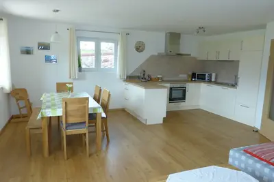 Image de Appartement neuf de 84m² à Berghof avec terrasse et vue sur la montagne dans un emplacement idéal