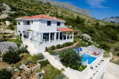 Image de Villa moderne directement sur la mer (170m) + piscine, vue mer panoramique, plage de sable, bien-être