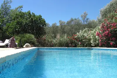 Image de Maison Piscine 4 ch bien équipé. Plage possible à pied ou 5mn voiture Palombaggia