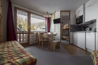 Image de Appartement skis aux pieds et au départ des randonnées.