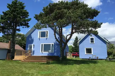 Image de Maison en bord de mer avec façade sur le rivage et belles vues