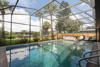 Image de A Fisherman's Dream! Large Pool, Hot Tub, Canal front, Private Dock, a Must See!
