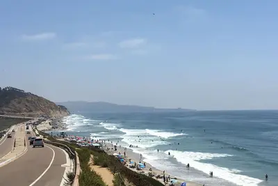 Image de Maison de ville amusante et relaxante à quelques pas de la plage!