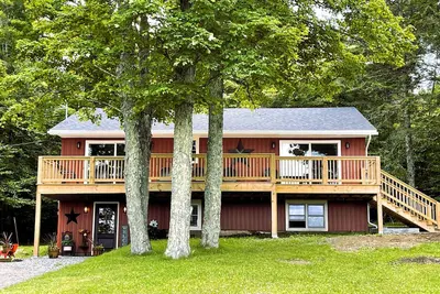 Image de La vieille roue - Rustic Log Cabin