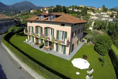 Image de Appartement de luxe dans villa, vue sur le lac et jardin privé