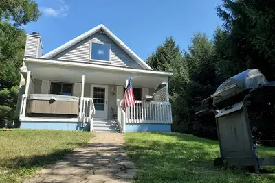 Image de Nord du Michigan, authentique, sur le lac, dans les bois, maison de vacances élégante