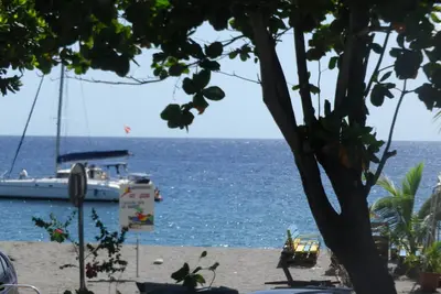 Image de L'Amandier Rose, T3 paisible et cosy face à la mer des Caraïbes