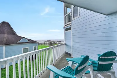 Image de Cozy Beach Cottage sur la plage avec vue sur le golfe et les zones de pique-nique