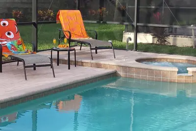 Image de Villa de luxe 6 chambres / 4 salles de bain avec piscine privée plein sud à 2 miles de Disney