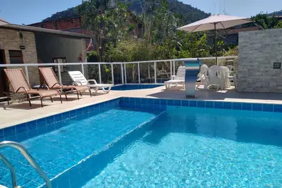 Image de Appartement de 2 dortoirs, meublé avec piscine, aire de jeux et barbecue.