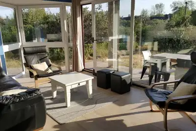 Image de Appartement ensoleillé au rez-de-chaussée avec terrasse, jardin et vue sur les dunes