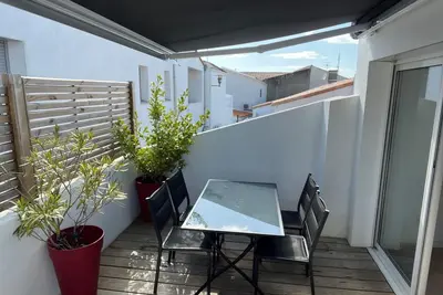 Image de Maison au cœur de la ville, proche de la plage. Terrasse plein sud.