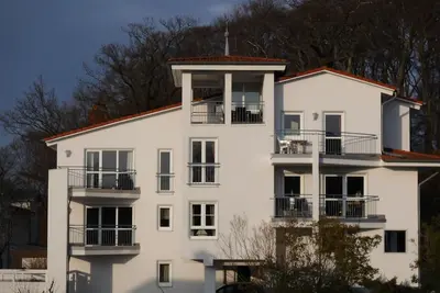 Image de Appartement **** 52m², centr. Lieu, balcon sud, propre. ebenerd. Local à vélo, WiFi, parking