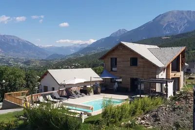 Image de Maison entre Lac et Montagne
