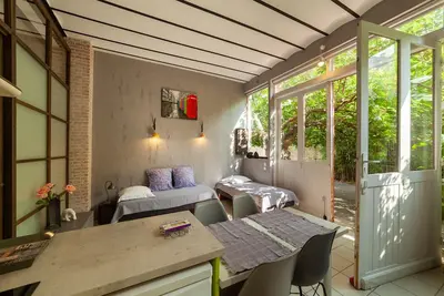 Image de Loft urbain tout confort-Piscine & Jacuzzi à la belle saison-Accueil Vélos Motos
