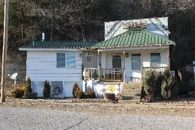 Image de Grande cabane sur la rivière Osage à Tuscumbia, Mo
