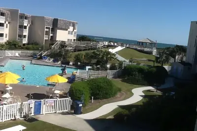 Image de 2 Br 2 Bath Condo Oceanfront Resort 2 piscines et toboggan
