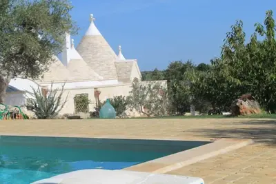 Image de Trulli di Cristoforo charme au coeur du Salento avec piscine et jarden prive'