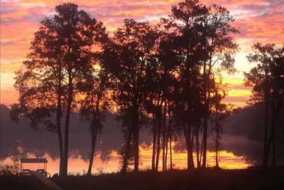 Image de Florida Log Cabin Lakefront