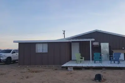 Image de La cabane Wolf House avec 5 hectares clôturés et une tour de guet