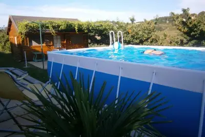 Image de Maison en bois avec piscine privative