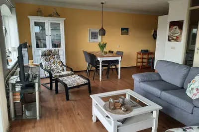 Image de Appartement confortable avec terrasse, juste derrière les dunes, à seulement 7 minutes de la plage