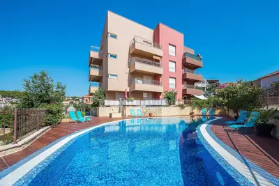 Image de Appartement avec piscine de 110 m2, à seulement 100 mètres de la plage, à 2 km de la vieille ville de Trogir