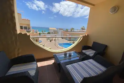 Image de Appartement, emplacement de rĂŞve, sur la plage de sable, WiFi sur demande, piscine communautaire