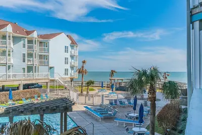 Image de Super Condo Ă Seascape. Juste Ă quelques pas de la plage!