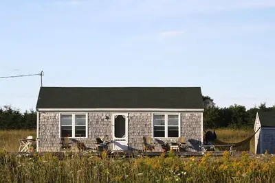 Image de chalet bord de l'eau à l'entrée de Greenwich parc national