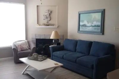 Image de \"Island Breeze\" est un condo mignon 1 chambre, distance de marche de la plage