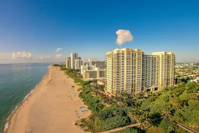 Image de 25% de réduction sur une vue imprenable sur l'océan à Palm Beach Resort & Spa, magnifique et confortable unité de condo 911