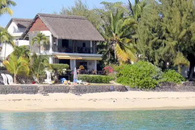 Image de Sur la Plage - Site de Reve - Penthouse dans Luxieuse Villa